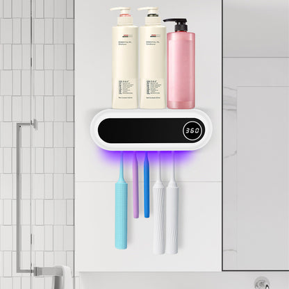 Support à brosses à dents mural avec distributeur de dentifrice dans une salle de bain