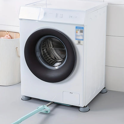 Quatre coussinets anti-vibration installés sous les pieds d'une laveuse