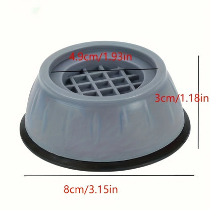 Quatre coussinets anti-vibration installés sous les pieds d'une laveuse